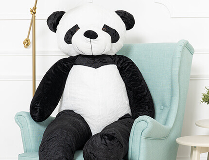 Grandi panda di peluche